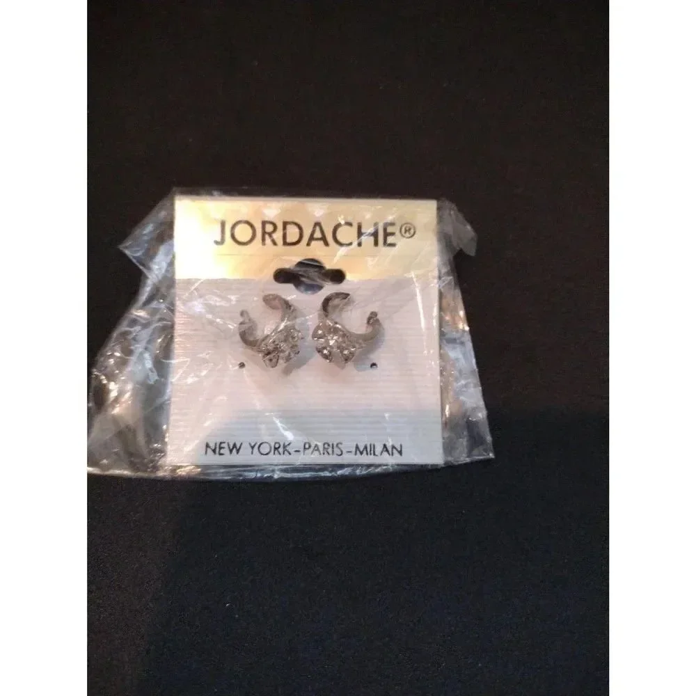 Lot of three pairs of costume jewelry earrings